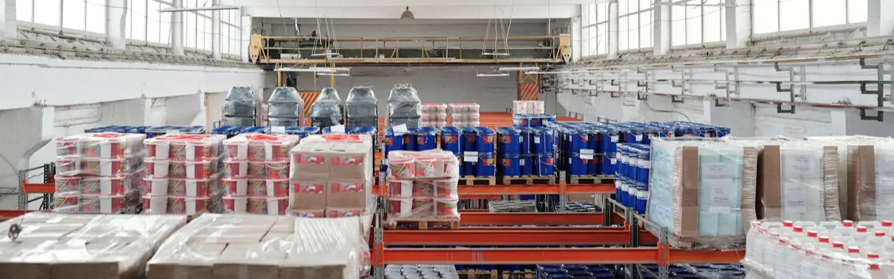 a warehouse in which some stored items are visible