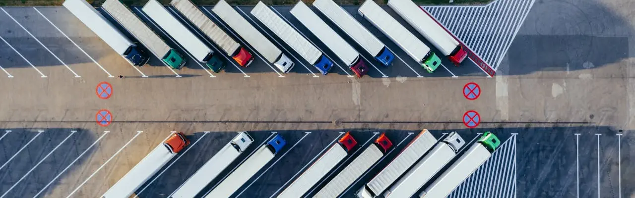 aerial view of several parked cargo trucks